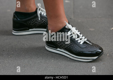 MILAN - SEPTEMBER 23: Woman with black Louis Vuitton bag with pink flames  before Antonio Marras fashion show, Milan Fashion Week street style on  Septe Stock Photo - Alamy