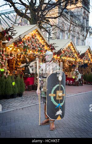 Chester, UK. 8th December, 2016. Roman Centurion soldier at the Mid-Winter Watch Parade, Chester’s 15th-century tradition of ‘Setting the Watch’. Karamba Samba a ‘ghost band’ led a fun parade of skeletons, angels and devils as they celebrated the Winter solstice. This pre-Christmas event dates from the 1400’s, where the city leaders would hand over the keys of Chester to the City Watch – the early police force. Stock Photo