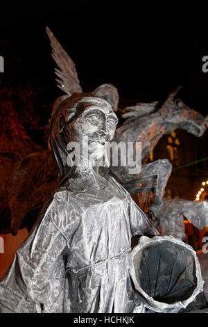 Chester, UK. 8th December, 2016. Mid-Winter Watch Parade, Chester’s 15th-century tradition of ‘Setting the Watch’. Karamba Samba a ‘ghost band’ led a fun parade of skeletons, angels and devils as they celebrated the Winter solstice. This event with dancers, fire breathing and sword fights, dates from the 1400’s, where the city leaders would hand over the keys of Chester to the City Watch – the early police force.  Credit:  Cernan Elias/Alamy Live News Stock Photo