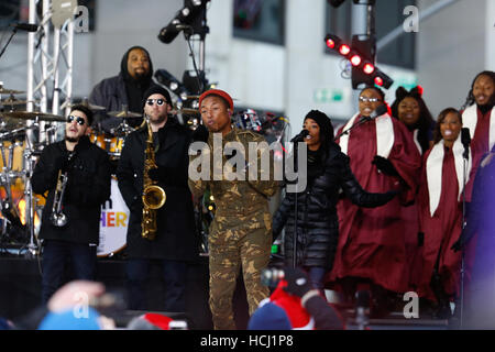 New York, USA. 09th Dec, 2016. Pharrell Williams performs tracks from the 'Hidden Figures' soundtrack, live on the Today Show. © The Photo Access/Alamy Live News Stock Photo