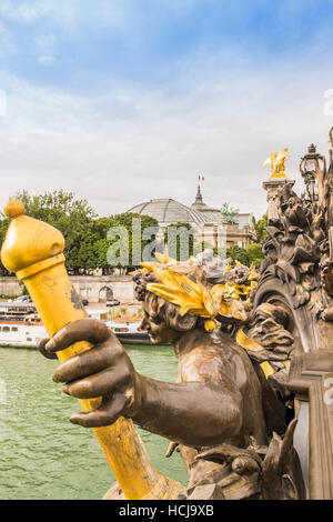 pont alexandre III,grand palais museum with french national flag on top in the background Stock Photo