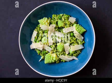 Green risotto with romanesco cauliflower and parmesan Stock Photo
