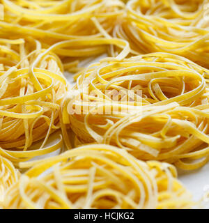 Fettuccine nests dried pasta Stock Photo