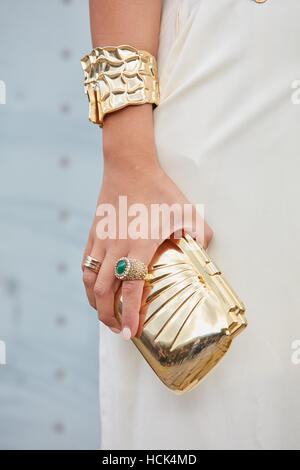 Woman with golden Chanel bag and red dress before Max Mara fashion show,  Milan Fashion Week street style on September 21, 2017 in Milan. – Stock  Editorial Photo © AndreaA. #272154660