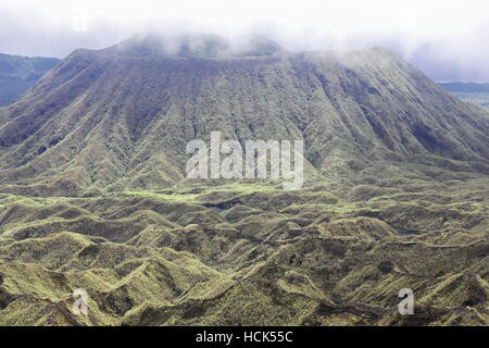 Trunk cone of Marumligar volcanic crater at at 957 ms.high seen from the way down the Mount Marum active volcano inside the 8x12kms.wide Ambrym island Stock Photo