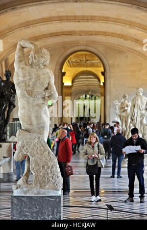 One of the halls of the Denon wing in Louvre museum (the one with the 'Dying Slave' by Michelangelo) dedicated to sculpture. Stock Photo