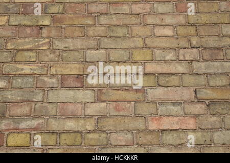 Large brick wall background in a n alley way Stock Photo