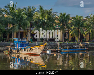 Traditional blue wooden boats in Hoi An Vietnam Stock Photo