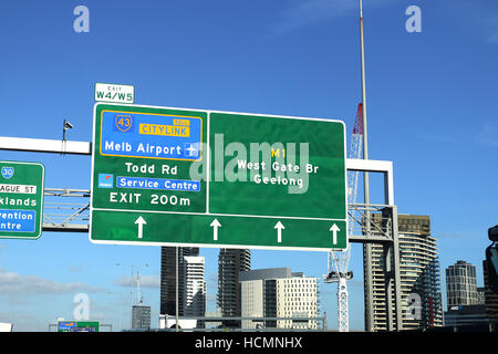 Road sign boards to Melbourne airport, Geelong, West Gate Bridge and Todd Road in Melbourne Freeway Victoria Australia Stock Photo