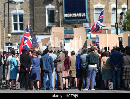 A scene portraying a race riot in Brixton in 1971 for the Sky Atlantic mini-series Guerrilla, starring Idris Elba, being filmed in North London  Featuring: Atmosphere Where: London, United Kingdom When: 17 Aug 2016 Stock Photo