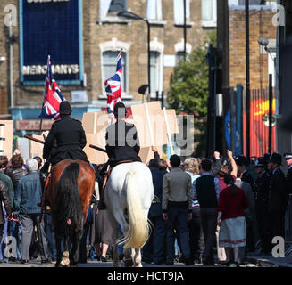 A scene portraying a race riot in Brixton in 1971 for the Sky Atlantic mini-series Guerrilla, starring Idris Elba, being filmed in North London  Featuring: Atmosphere Where: London, United Kingdom When: 17 Aug 2016 Stock Photo