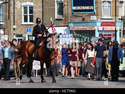 A scene portraying a race riot in Brixton in 1971 for the Sky Atlantic mini-series Guerrilla, starring Idris Elba, being filmed in North London  Featuring: Atmosphere Where: London, United Kingdom When: 17 Aug 2016 Stock Photo