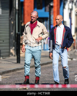 A scene portraying a race riot in Brixton in 1971 for the Sky Atlantic mini-series Guerrilla, starring Idris Elba, being filmed in North London  Featuring: Atmosphere Where: London, United Kingdom When: 17 Aug 2016 Stock Photo