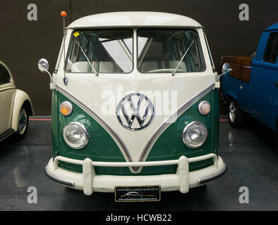 A white and green VW Bus from the 1960's - the so-call splitscreen type Stock Photo