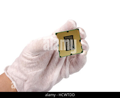 Electronic collection - Hand and CPU from the bottom side isolated on white background Stock Photo
