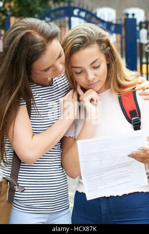 Teenage Girl Consoles Friend Over Bad Exam Result Stock Photo