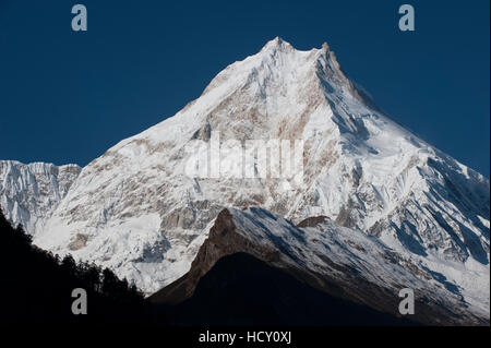 At 8156m, Manaslu is the eighth highest mountain in the world, and a magnificent sight, Nepal Stock Photo