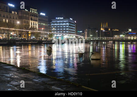 Geneva, Switzerland - November 24, 2016: Night cityscape with illuminated building facades of Geneva city Stock Photo