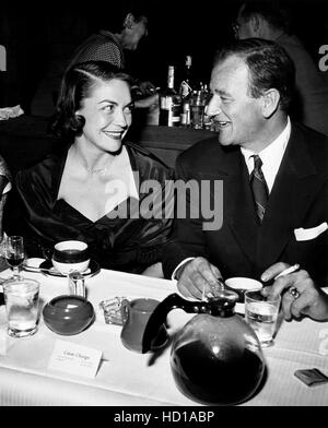 John Wayne and his wife, Esperanza Baur at their San Fernando Valley