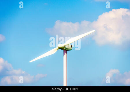 Wind Turbine Blades of modern Windmills in a large Wind Farm along the Shore of Veluwemeer in the Netherlands Stock Photo