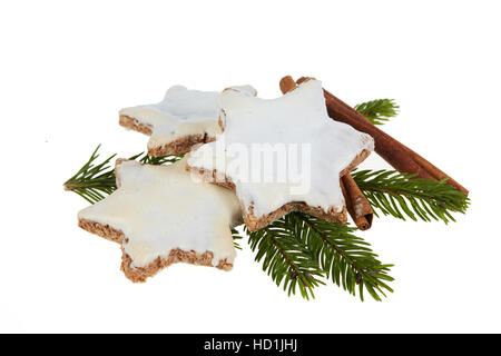 Christmas cookies cinnamon stars and fir branch isolated Stock Photo