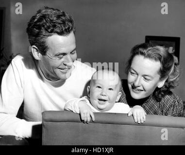 Robert Ryan, left, and his wife Jessica Ryan, right, with their ...