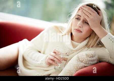 Girl with hangover Stock Photo