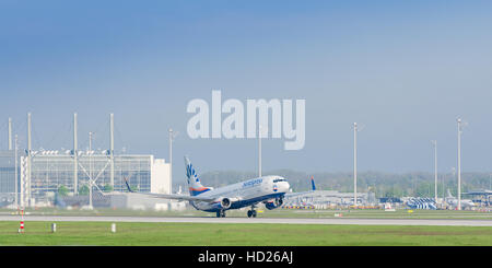 Plane Boeing 737-800 of SunExpress - German leisure airlines take off from Munich international airport Stock Photo