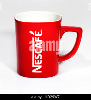 Nescafe mug, red mug Stock Photo