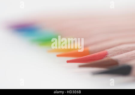Colouring pencils lined up together, focused on red pencil Stock Photo