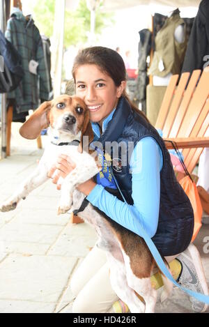 Matt Lauer and family adopt a dog from the ASPCA during the Hampton Classic Horse Show  Featuring: Romy Lauer and Mocha the dog Where: Bridgehampton, New York, United States When: 05 Sep 2016 Stock Photo