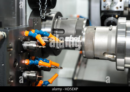Operator machining process mold and die part for automotive industrial working in factory. Stock Photo