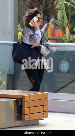 Vanessa Hudgens hides her face with her cell phones as she arrives at the gym in West Hollywood  Featuring: Vanessa Hudgens Where: West Hollywood, California, United States When: 07 Sep 2016 Stock Photo