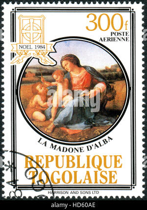 A stamp printed in Togo, shows the painting Alba Madonna, by the Italian Renaissance artist Raphael Stock Photo