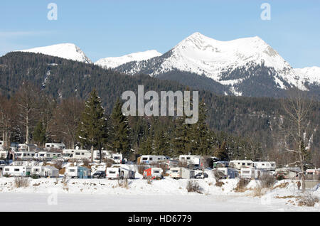 Caravans in winter, Alpine Caravan Park Tennsee near Cologne, Upper Bavaria, Bavaria Stock Photo