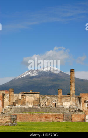 Ruins of the Temple of Jupiter in front of the snow-capped Mount Vesuvius Volcano, Pompeii, Italy, Europe Stock Photo