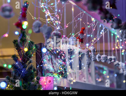 Xmas tree garlands and decorations at one of the many stalls on the Christmas Market in Vilnius. Stock Photo