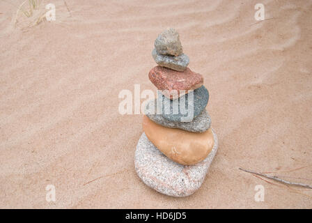 A cairn built of different stones on a beach on the Colorado River, Grand Canyon National Park, Arizona. Stock Photo