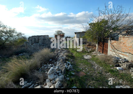 The village Agios Fotios near Statos in the Paphos wine region Southern Cyprus was abandoned after an earthquake  in 1969. Stock Photo