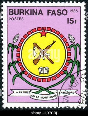 BURKINA FASO - CIRCA 1985: A stamp printed in Burkina Faso, shows the Coat of Arms, circa 1985 Stock Photo