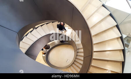 The modern spiral staircase at the Wellcome Trust Collection Museum, London England. Designed by Wilkinson Eyre Architects. Stock Photo