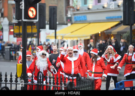 London, UK. 10th Dec, 2016. Santacon London with hundreds of people dressed as Santa, Reindeer and Elves. Stock Photo