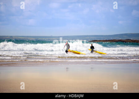 lifeguards training in the surf on ballybunion beach county kerry ireland Stock Photo