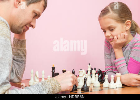 The Pope and the seven-year daughter playing chess Stock Photo