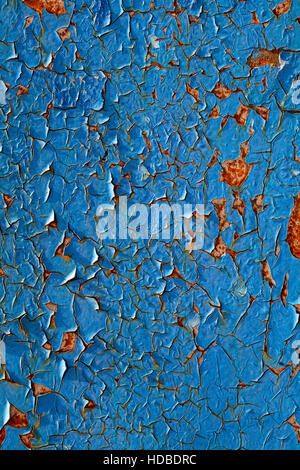 Close-up of peeling paint and rust on a wall Stock Photo