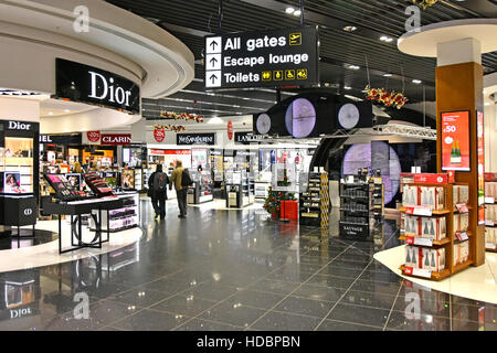 Perfume shopping airport terminal building interior Stansted Airport for London England UK where passengers walk through to reach departure lounge Stock Photo