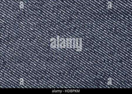 Black denim close up. Fabric macro texture and background Stock Photo