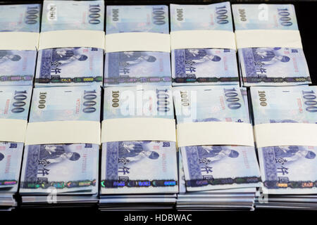 Stacks of New Taiwan Dollar bills Stock Photo