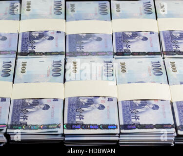 Stacks of New Taiwan Dollar bills Stock Photo