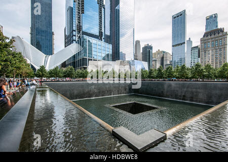 North Pool, World Trade Center Transportation Hub behind, Ground Zero, Manhattan, New York, USA Stock Photo